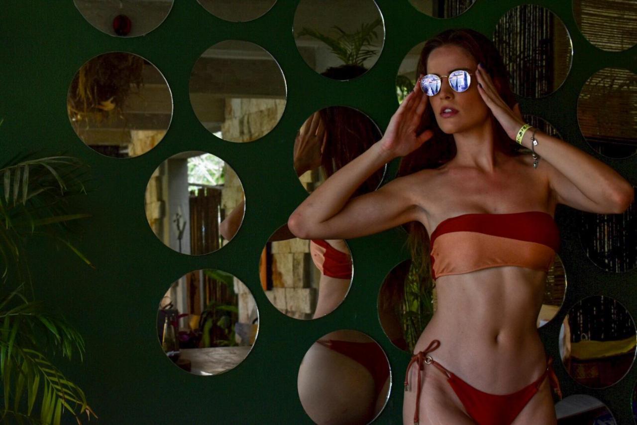 Hotel Makaaba Eco-Boutique Bacalar Kültér fotó A model wearing a two-piece swimsuit
