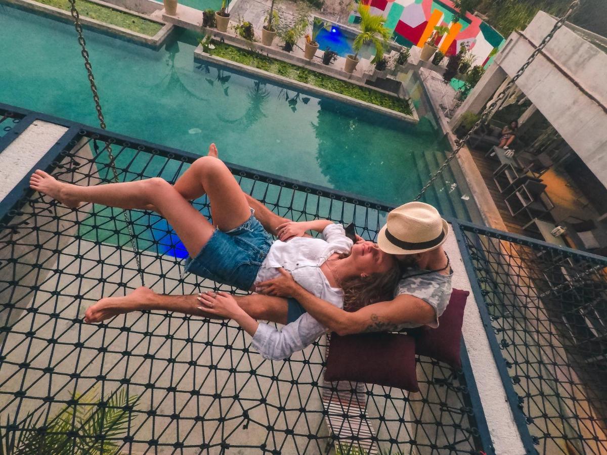 Hotel Makaaba Eco-Boutique Bacalar Kültér fotó A couple on a hammock